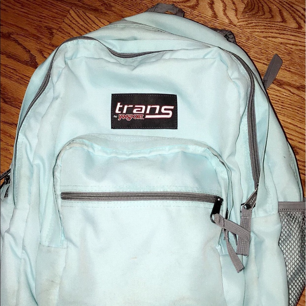 A turquoise backpack.
